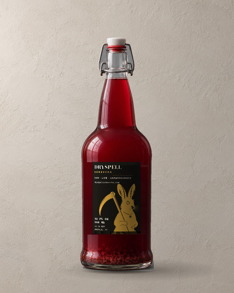 Dryspell 32 oz swing-top bottle, deep red kombucha